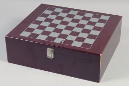 A NAPOLEONIC CHESS SET, unused, in original box.
