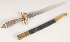 A GERMAN HUNTING DIRK, early 20th century, straight single edged blade etched with hunting scenes,