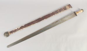 A THEATRICAL REPLICA OF A VIKING BROAD SWORD, early 20th century, wide tapering blunt 37 in blade