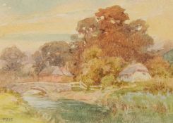 A watercolour of 'Wareham', a view of houses near a bridge over a river, initialled F.J.K, 2.75