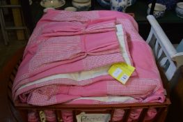 A pair of pink and pink check curtains each curtain 120cm wide x 200cm drop.