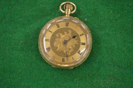 A Ladies engraved gold pocket watch hallmarked 18 carat gold.