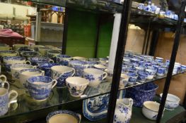 A large quantity of blue and white cups and mugs.