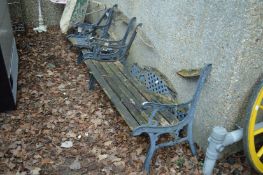 A garden bench and pair of matching armchairs (as found).