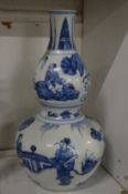 A Chinese blue and white gourd shaped vase.