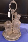 A pewter bottle cruet.