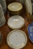 Various sets of gilt decorated plates.