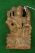 An early Eastern carved soap stone deity.
