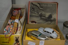 An Auto-Dux boxed pair of model cars together with a Pelham puppet.