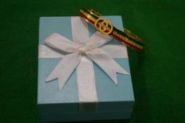 A decorative bangle.