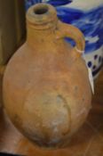 An old stoneware flagon.