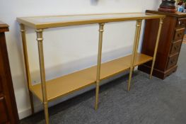 A modern gilt metal and glass console table.