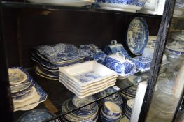 A quantity of blue and white serving dishes, cheese dishes etc.