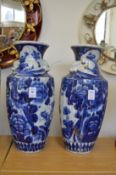 A pair of Oriental blue and white vases.