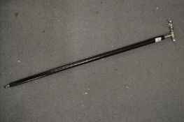 A walking stick, the handle modelled as the Jaguar car mascot.