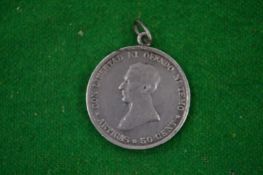 A 1917 Uruguay Oriental coin.