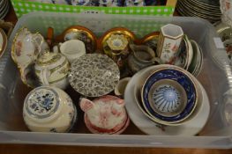 Two boxes of decorative china.