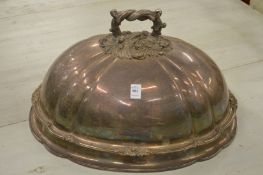 A large and impressive plated meat dome with engraved armorial.