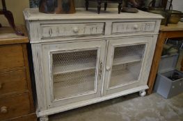 A distress painted dresser base.