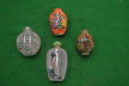 Four snuff bottles.
