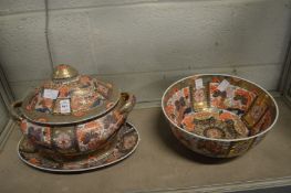 A Japanese imari style tureen cover and stand together with a similar bowl.