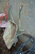 An old builders wheelbarrow.