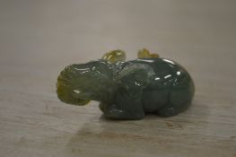 A Chinese carved jade model of an elephant.