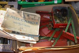 Meccano paperwork and parts.