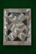 A Victorian mother of pearl calling card case.