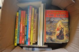 A box of childrens annuals etc.