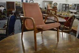 Yngve Ekstrom a stylish teak framed open armchair.