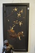A pair of Japanese ebonised panels with inlaid and onlaid decoration (losses).