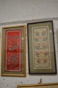 Two Chinese embroidered pictures depicting numerous figures in rowing boats.