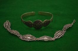 A filigree bracelet and a bangle.