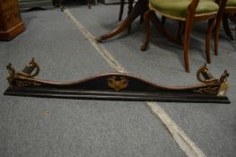 A Victorian steel and cast iron serpentine shaped fender with lion ring handles, 4' 4