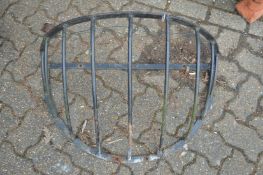 A wrought iron hay manger.