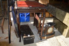 Household furniture and a mantel clock.