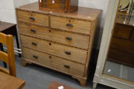 A mahogany chest of drawers.