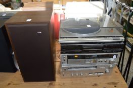 A pair of B and W speakers and various Technics Hi-Fi separates.