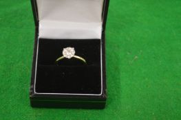 A 9 carat gold and diamond cluster ring.