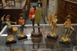 A group of five military figures.