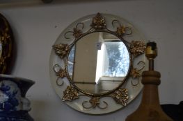Decorative circular mirror.