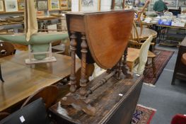 A Victorian walnut sutherland table.