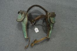 A pair of American Indian/Civil War personal pommel holsters, late 19th century, green leather, with