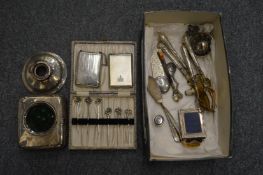 A silver combination cigarette case/compact and other small items of silverware.