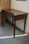 A 19th century mahogany single drawer concave fronted side table on turned supports.