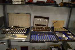 A cased set of six silver handled fruit knives and forks and other flatware, mostly cased.
