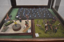 Three mounted groups of military figures.