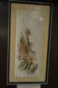 Oriental embroidered picture of a tiger.