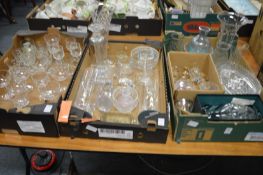 A good collection of glass vases, dishes, champagne glasses etc.